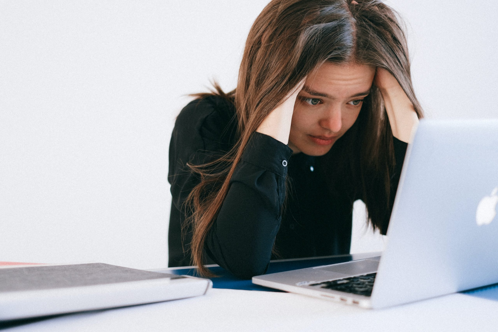 a woman using a laptop computer